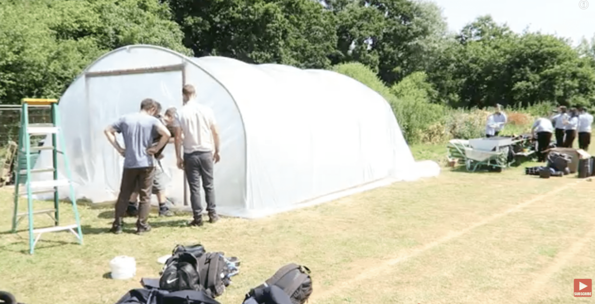 Tony O'Neill helping rebuild the polytunnel at Neatherd High School, Norfolk