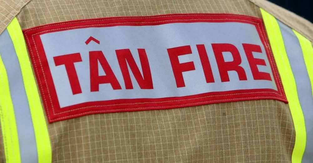 South Wales Fire and Rescue Service badge on tunic